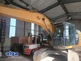 2011 Caterpillar 324E crawler excavator, side view