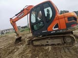 Doosan DX75-9C excavator, side view