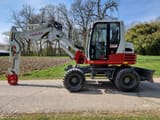 2015 Takeuchi TB295W wheel excavator, side view