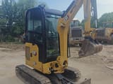 2020 Caterpillar 302CR mini excavator, front three-quarter view