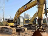 2024 Caterpillar 323 crawler excavator, side view