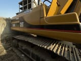 2010 Caterpillar 325BL crawler excavator side view