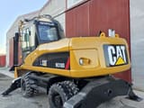 2007 Caterpillar M318D wheel excavator rear three-quarter view