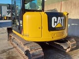 2019 Caterpillar 308E2CR crawler excavator, rear three-quarter view