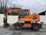 2012 Volvo EW140D wheel excavator, side view