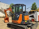2023 Hitachi ZX55 mini excavator, rear three-quarter view