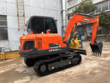 2022 Doosan DX60-9C crawler excavator, rear three-quarter view