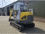 2012 Wacker Neuson 6003 crawler excavator, rear three-quarter view
