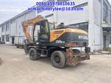 2022 Hyundai R210W-9 wheel excavator rear three-quarter view
