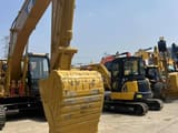 Escavatore cingolato Caterpillar 320CL del 2024, vista frontale della benna