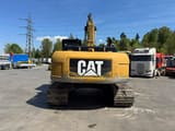 2011 Caterpillar 324D crawler excavator, rear view