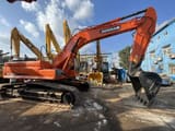 2019 Doosan DX300LC crawler excavator, rear three-quarter view