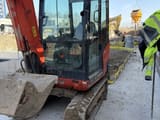 2022 Kubota KX027-4 mini excavator, front three-quarter view