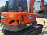 2020 Doosan DH55 excavator, rear three-quarter view