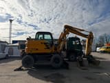 2012 New Holland MH 2.6 wheel excavator, side view