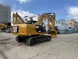 2023 Caterpillar 320D Raupenbagger, Ansicht von hinten dreiviertel