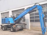 2016 Fuchs MHL320F material handler, side profile view