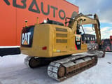 2017 Caterpillar 323F crawler excavator, rear three-quarter view