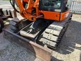2016 Komatsu PC80MR-3 mini excavator front view with blade