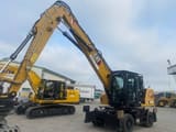 2024 Caterpillar MH3022-07D material handler, front three-quarter view