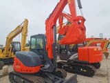 2023 Hitachi ZX60U mini excavator, rear three-quarter view