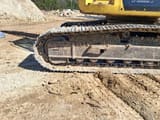 2009 New Holland E235BSR-2 crawler excavator undercarriage view