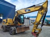 2009 Caterpillar M315D wheel excavator, side profile view