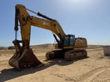 2022 Caterpillar 395 crawler excavator, side profile view