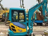 Kubota U-25 mini excavator, side view
