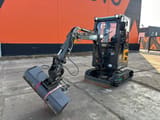2024 Multiloader EC 18 mini excavator, front three-quarter view