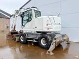 2012 Liebherr A914 COMPACT wheel excavator, rear three-quarter view