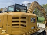 2024 Caterpillar 308E2 mini excavator rear three-quarter view