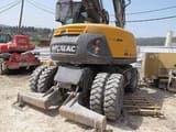 2013 Mecalac 714 MW wheel excavator, rear three-quarter view