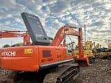 Hitachi Zaxis 240 crawler excavator, rear three-quarter view