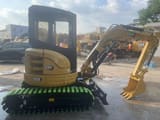 2020 Caterpillar 303E mini excavator, side profile view