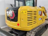 2022 Caterpillar 306E2 mini excavator, rear three-quarter view