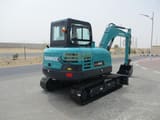 2025 Sunward SWE60E mini excavator, rear three-quarter view