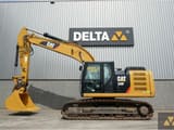 2017 Caterpillar 320FL crawler excavator, side view
