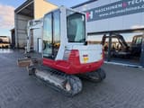 2017 Takeuchi TB250 mini excavator, rear three-quarter view