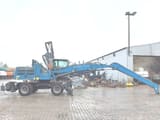 2014 Fuchs MHL 820 D E material handler, side view