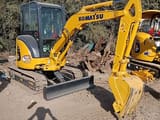 Komatsu PC30MR mini excavator, side view