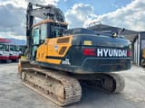 2023 Hyundai HX220AL crawler excavator, rear three-quarter view
