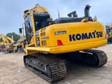 2024 Komatsu PC210 LC crawler excavator rear three-quarter view