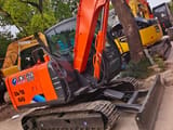2024 Hitachi ZAXIS 60 mini excavator, front three-quarter view
