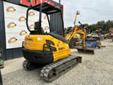 2016 Kubota KX61-3 mini excavator, rear three-quarter view