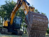 2019 JCB JS131LC excavator, low-angle front view