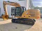 2023 Caterpillar 320GC crawler excavator, side profile view
