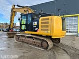 2017 Caterpillar 320FL crawler excavator, rear three-quarter view