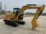 2022 Caterpillar 305.5E2 mini excavator, side view