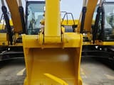 2026 Caterpillar 320GC crawler excavator, front view of bucket and boom